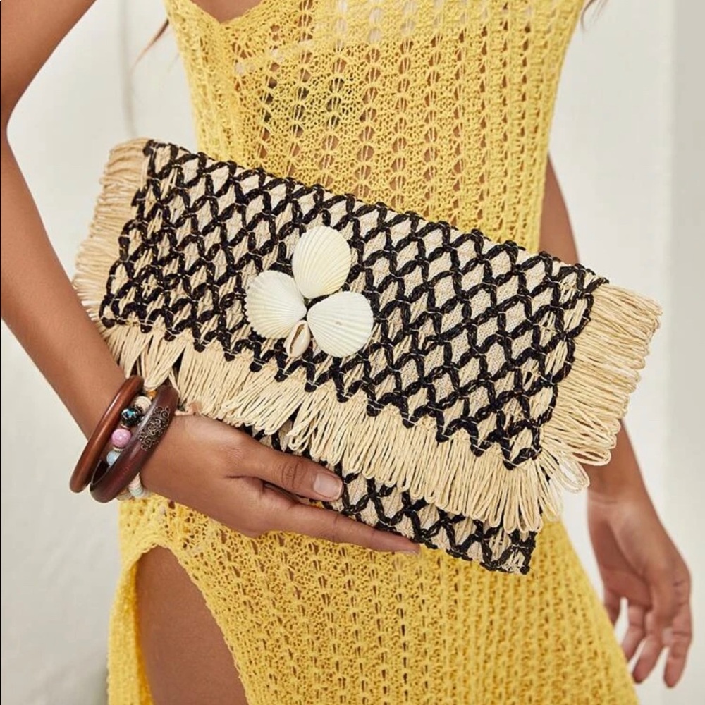 Shell  braided  clutch bag